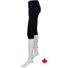 bottom of white mannequin wearing black elle 3/4 length leggings side view on white background