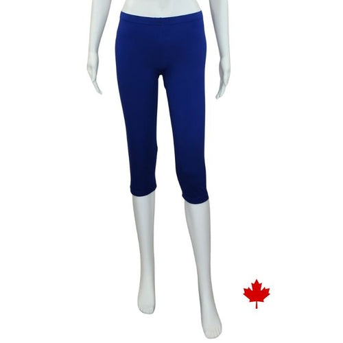 bottom of white mannequin wearing indigo blue elle 3/4 length leggings front view on white background