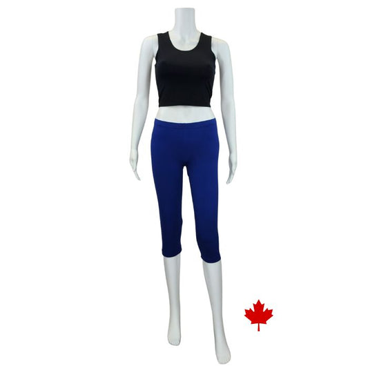 white mannequin wearing indigo blue elle 3/4 length leggings and stephanie crop tank top front view on white background