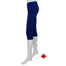 bottom of white mannequin wearing indigo blue elle 3/4 length leggings side view on white background
