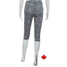 bottom of white mannequin wearing leopard print elle 3/4 length leggings back view on white background