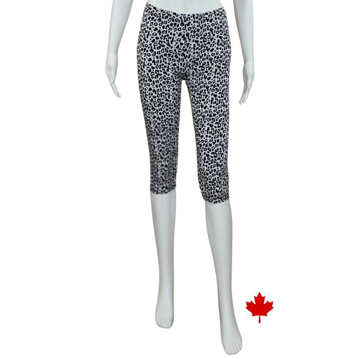 bottom of white mannequin wearing leopard print elle 3/4 length leggings front view on white background