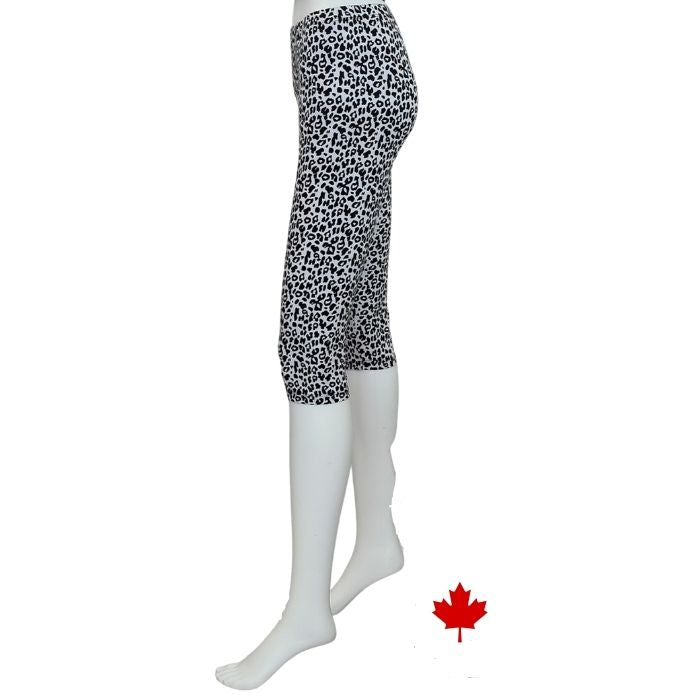 bottom of white mannequin wearing leopard print elle 3/4 length leggings side view on white background