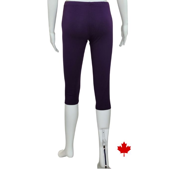 bottom of white mannequin wearing plum purple elle 3/4 length leggings back view on white background