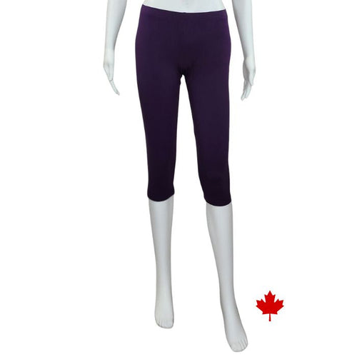 bottom of white mannequin wearing plum purple elle 3/4 length leggings front view on white background