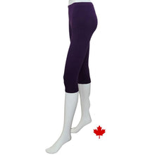 bottom of white mannequin wearing plum purple elle 3/4 length leggings side view on white background
