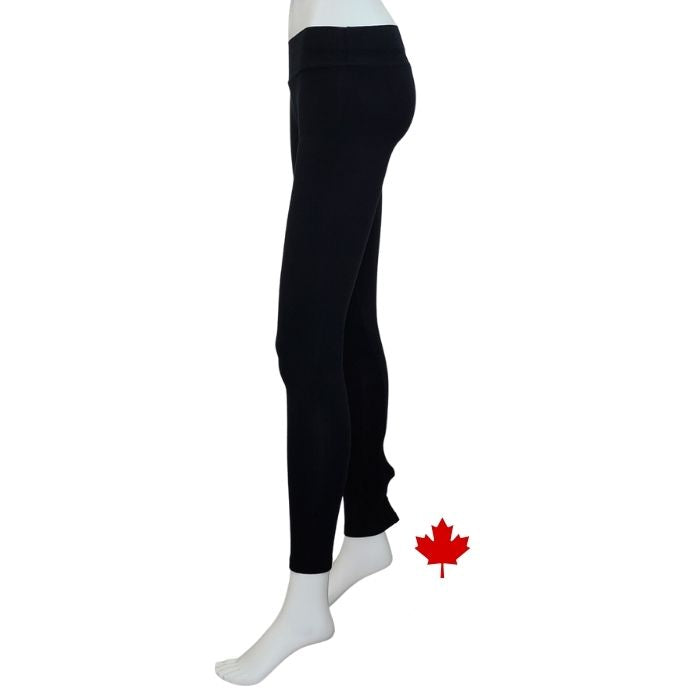 bottom of white mannequin wearing black eve full length leggings side view on white background