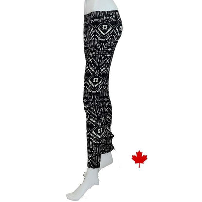 bottom of white mannequin wearing geometric print eve yoga full length leggings side view on white background