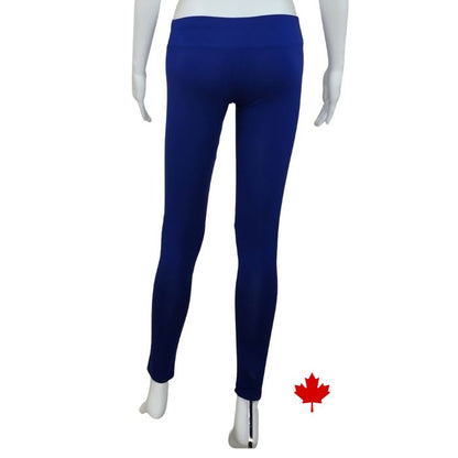 bottom of white mannequin wearing indigo blue eve full length leggings back view on white background