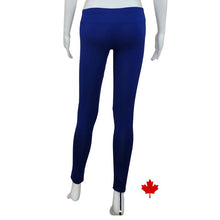 bottom of white mannequin wearing indigo blue eve full length leggings back view on white background