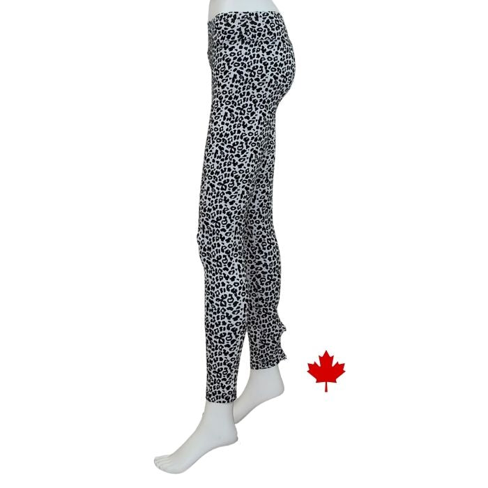bottom of white mannequin wearing leopard print eve yoga full length leggings side view on white background