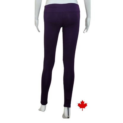 bottom of white mannequin wearing plum purple eve yoga full length leggings back view on white background
