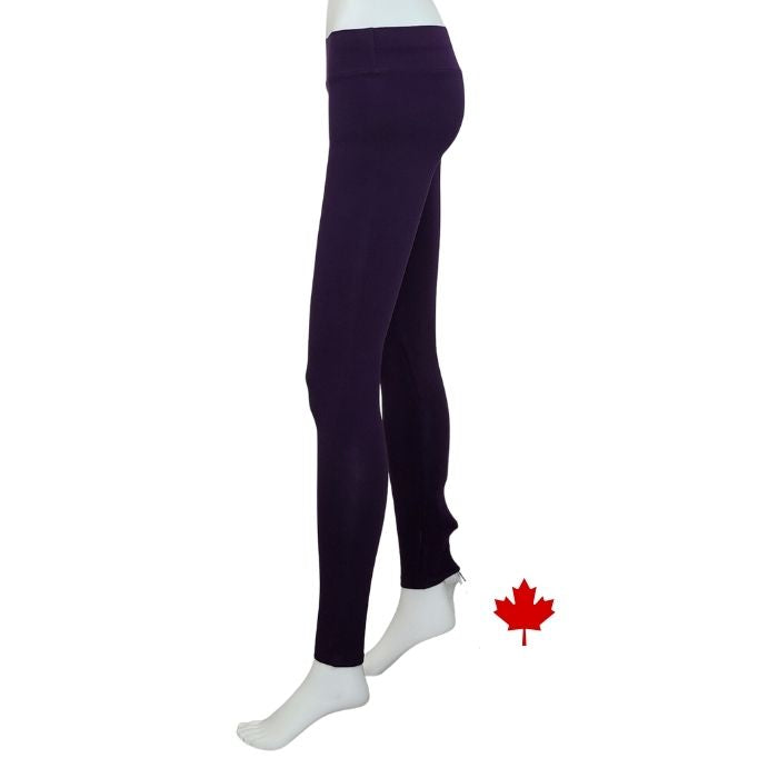 bottom of white mannequin wearing plum purple eve yoga full length leggings side view on white background