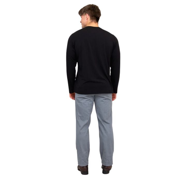 male model wearing black adam long sleeve shirt and grey pants back view on white background