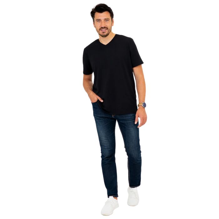 male model wearing black adam short sleeve shirt and blue jeans front view on white background