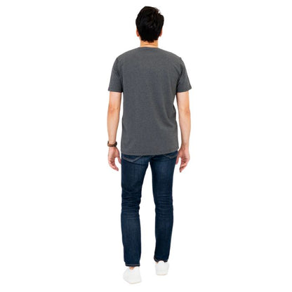 male model wearing graphite grey adam short sleeve shirt and blue jeans back view on white background