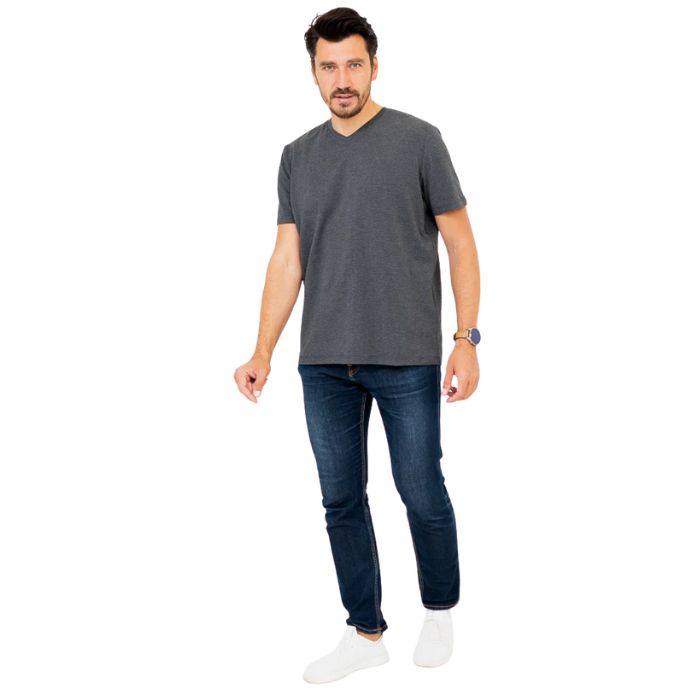 male model wearing graphite grey adam short sleeve shirt and blue jeans front view on white background