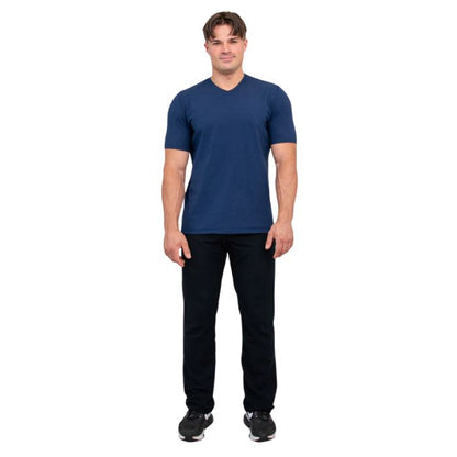 male model wearing indigo blue adam short sleeve shirt and black pants front view on white background