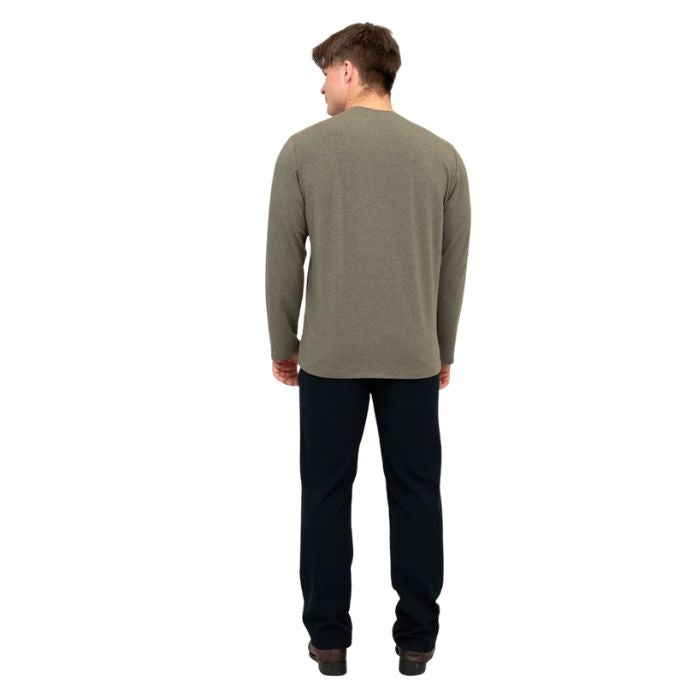 male model wearing khaki green adam long sleeve shirt and black pants front view on white background