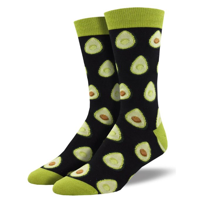 Any way you slice it socks a pair of black crew socks with halved avocado print on white background