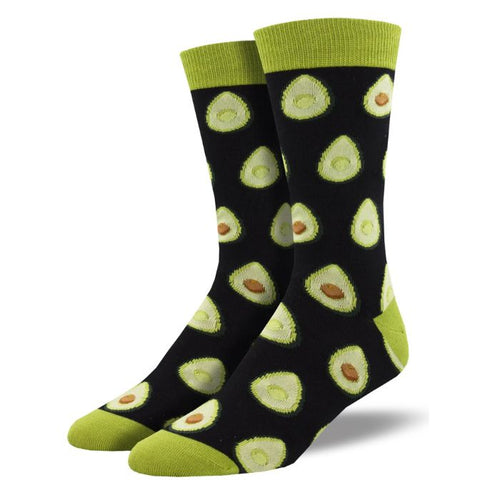 Any way you slice it socks a pair of black crew socks with halved avocado print on white background