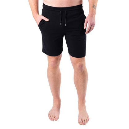 male model wearing black aspen shorts front view on white background