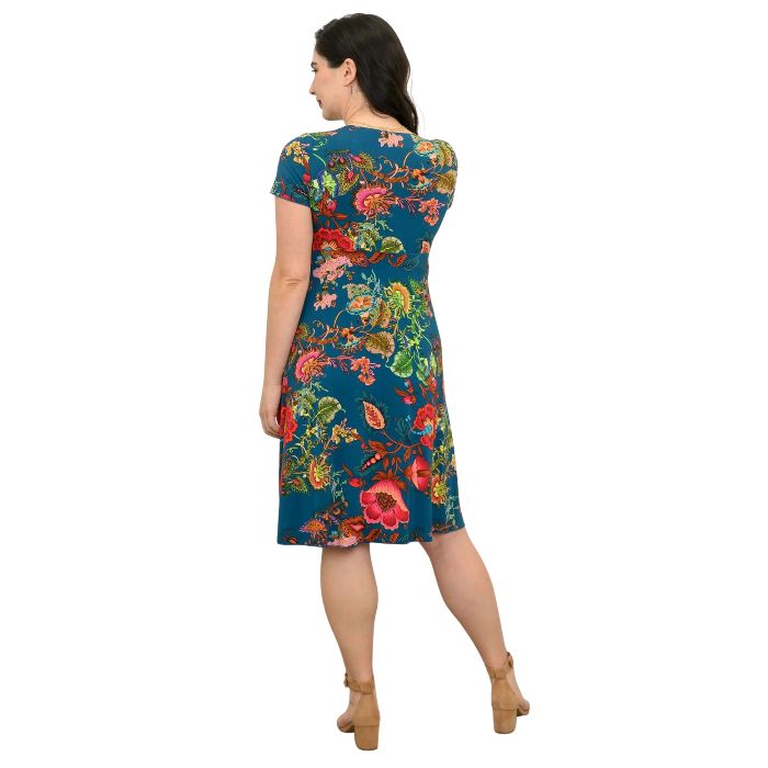 woman wearing teal fantasy print aurora dress back view set on a white background