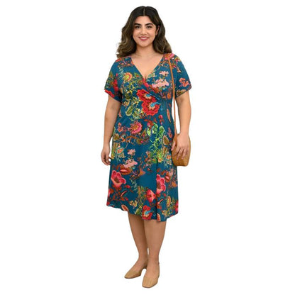 woman wearing teal fantasy print aurora dress front view set on a white background