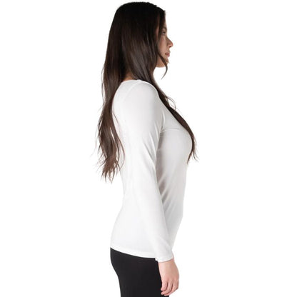 top of female model wearing white aurora long sleeve top side view on white background