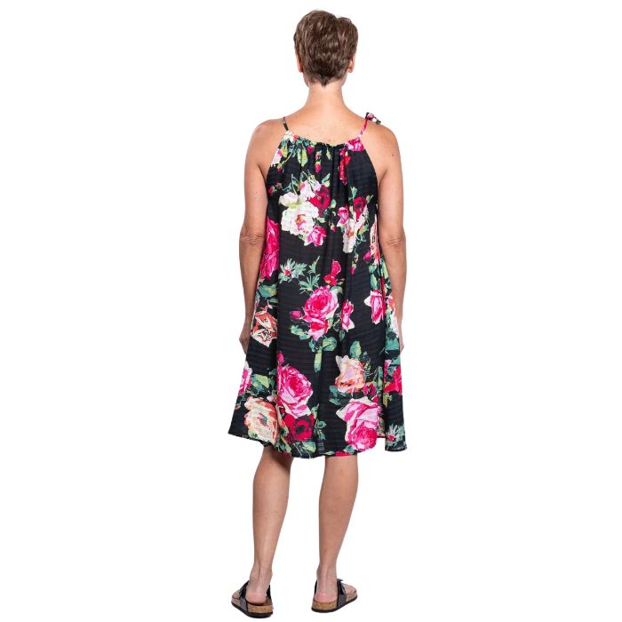 woman wearing bloomingdale print beach dress back view set on a white background