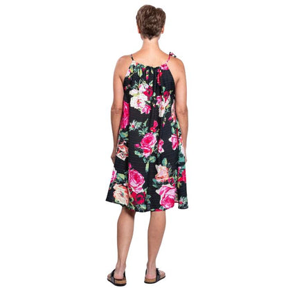 woman wearing bloomingdale print beach dress back view set on a white background