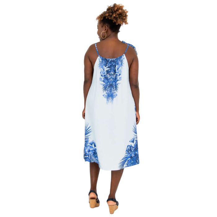 woman wearing blue print beach dress back view set on a white background