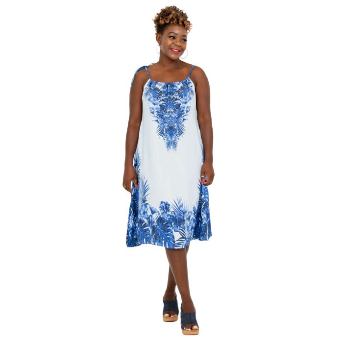 woman wearing blue print beach dress front view set on a white background