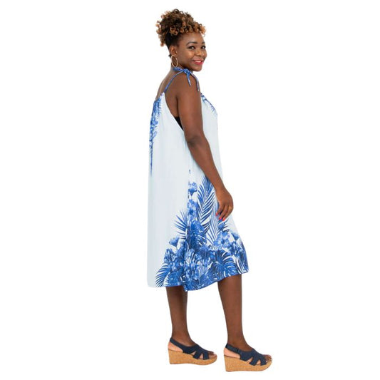 woman wearing blue print beach dress side  view set on a white background