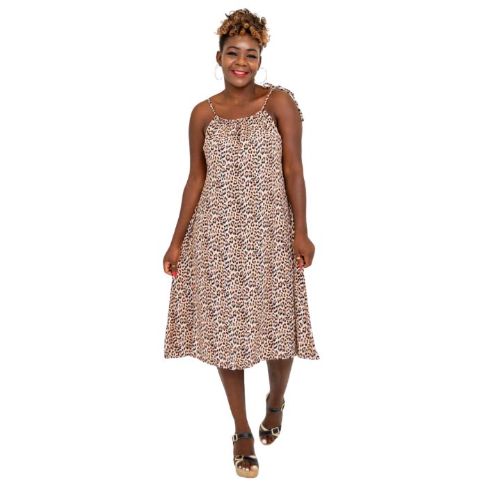 woman wearing leopard print beach dress front view set on a white background