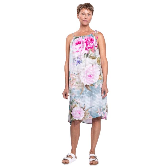 woman wearing rosa print beach dress front view set on a white background