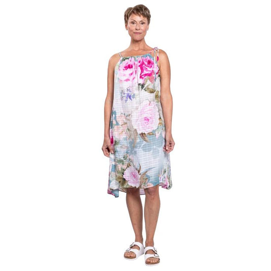 woman wearing rosa print beach dress front view set on a white background