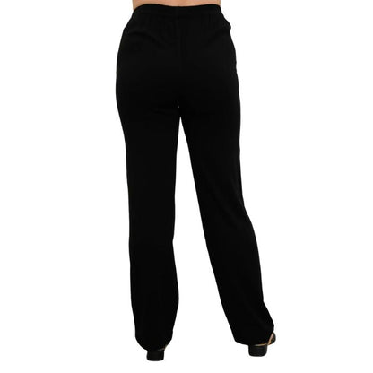 female model wearing black bella pants back view on white background