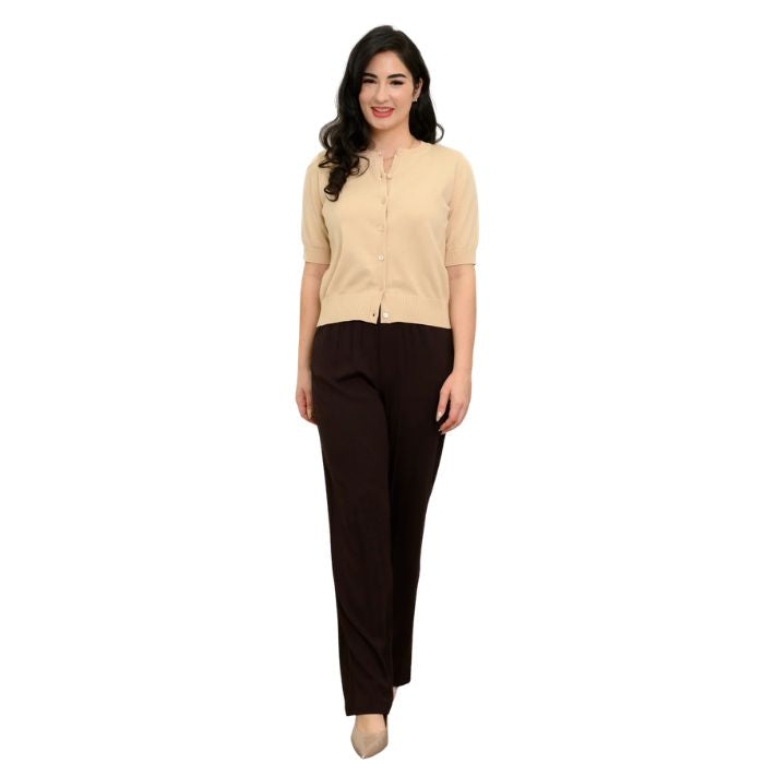 female model wearing chocolate brown bella pants and beige brown shen cardigan front view on white background