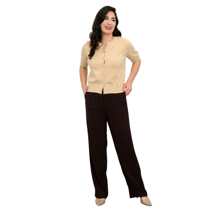 female model wearing chocolate brown bella pants and beige brown shen cardigan front view on white background