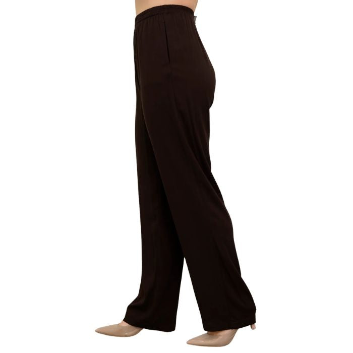 female model wearing chocolate brown bella pants side view on white background