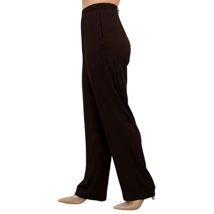 female model wearing chocolate brown bella pants side view on white background