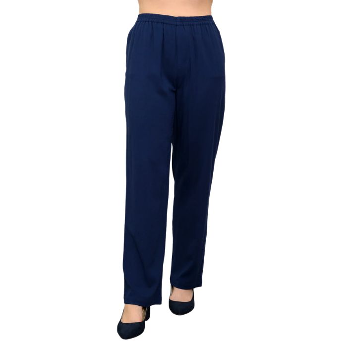 female model wearing indigo blue bella pants front view on white background