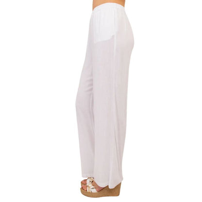 female model wearing white bella pants side view on white background