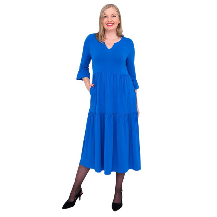 female model wearing cobalt blue bernadette dress front view on white background