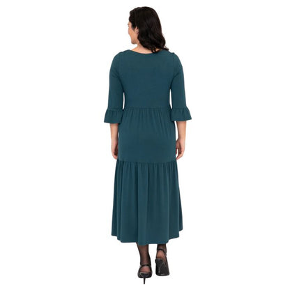 female model wearing teal green bernadette dress back view on white background