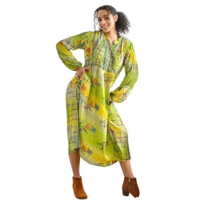 female model wearing blue bayou dress mixed prints front view on white background