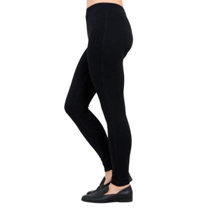 bottom of female model wearing bobbi black fleece leggings side view on white background