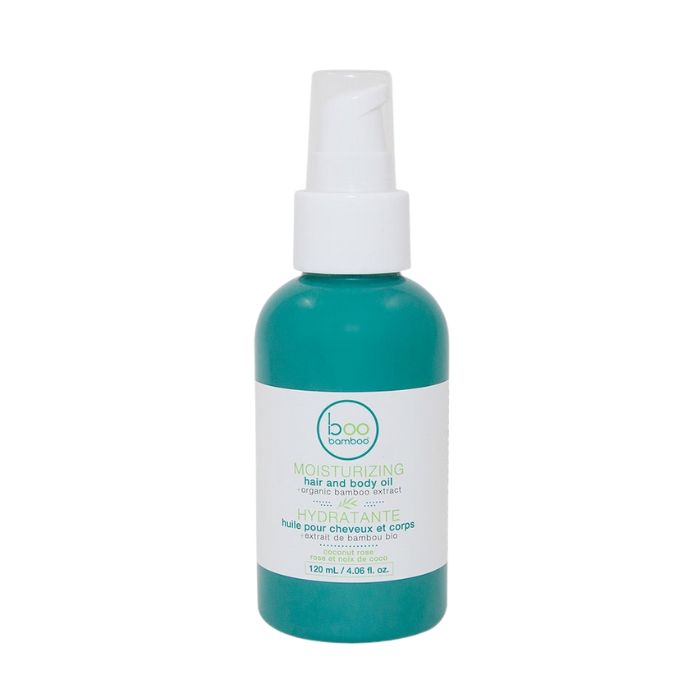Moisturizing hair and body oil front view of 120ml bottle with pump on white background