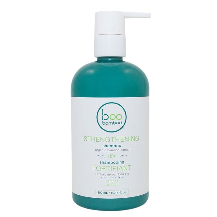 Strengthening shampoo front view of 300ml bottle with pump on white background